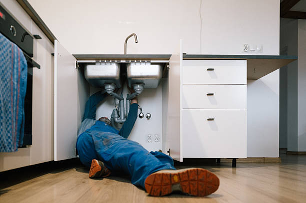 Professional Emergency Plumber technician working in Elon, NC